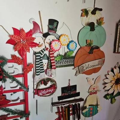 Christmas & other Holiday Decor on or Aganst Wall. 