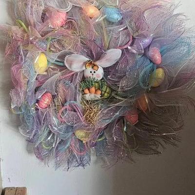 Easter Decor on Wall, Eggs in Tote & Items on Shelf in Closet. 