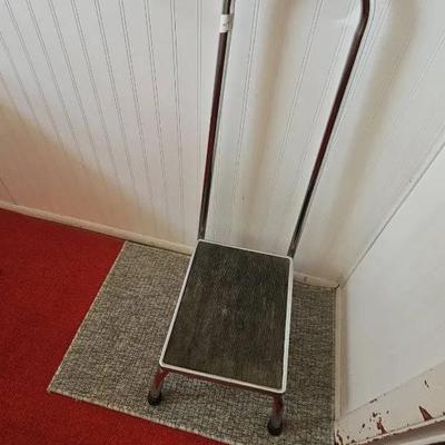Items On Utility Room Shelf • Medical Step Stool • Iron • Umbrellas