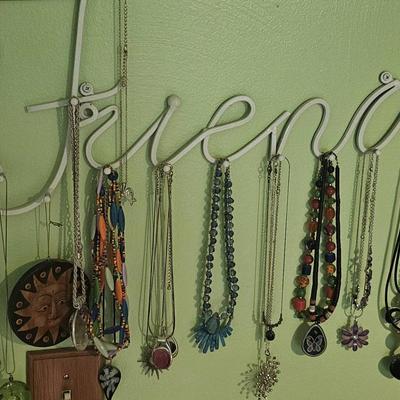 Necklaces Seen & Hangers on Wall