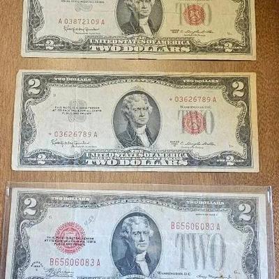 3 - Red Seal $2 bills. 1 Is Star Note. 
