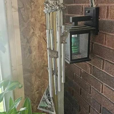 Welcome Signs, Wind Chimes, Broom, Metal in Corner, etc.