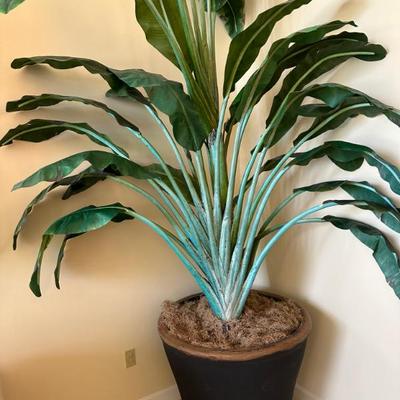 artificial silk plant 34 inches wide  vase is 32 high and plant from the top of the vase is 95 inches