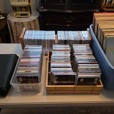 CDs, DVDs, vinyl records, cassette tapes