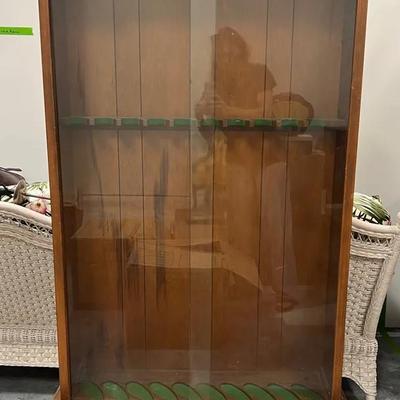 Lot 307: Wooden Gun Display Cabinet with Glass Door and Storage Drawer