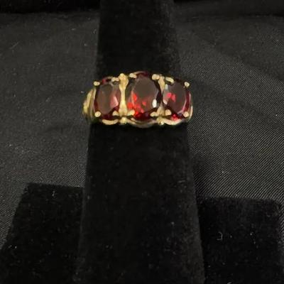 Lot 441: 10K Yellow Gold Ring with Three Deep Red Garnet Stones – .11 Grams