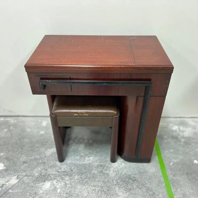 Lot 301: Vintage Singer 15-91 Sewing Machine in Wood Cabinet with Stool