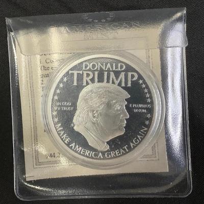 Lot 429: Donald Trump “Make America Great Again” Commemorative Coin – American Mint – Limited Editio