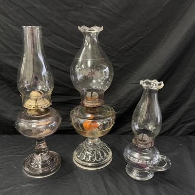 Lot 405: Lot of 3 Vintage Glass Kerosene Oil Lamps – Clear Pressed Glass with Chimneys