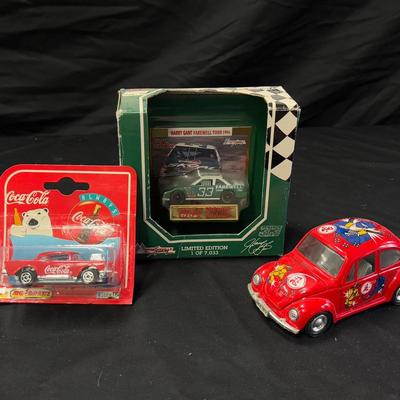 Lot 415: Vintage Coca-Cola Diecast Car Lot – Harry Gant 1994 NASCAR, Motorific Chevy, and VW Beetle
