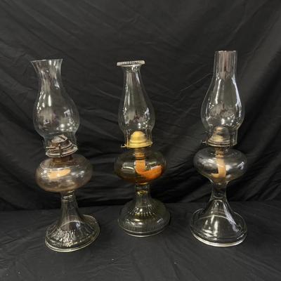Lot 406: Lot of 3 Vintage Glass Oil Lamps with Chimneys – Clear and Amber Pressed Glass Kerosene Lam