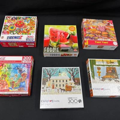 Lot 233: Puzzles And More Puzzles
