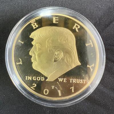 Lot 430: Donald Trump 2017 Gold-Tone Commemorative Coin – 45th President of the United States