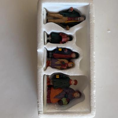 Carolers On The Doorstep