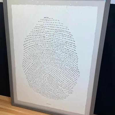 Framed art titled god's fingerprint"