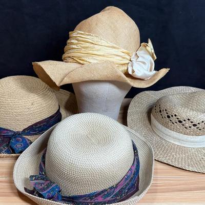 Four straw hats garden sun