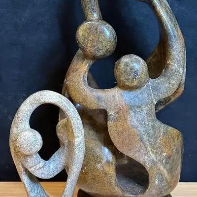 Soapstone family" sculpture