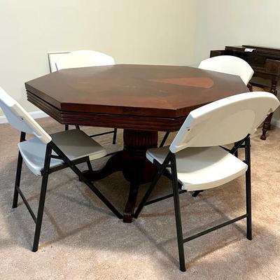 Cherry Sunburst Inlaid Octagonal Game Table with Four White Vinyl Folding Chairs