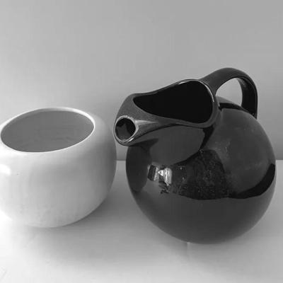 MCM Hall Tilted Ball Pitcher And McCoy Floraline Matte Bowl