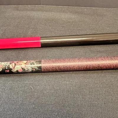 Two Pool Cue Sticks With Cases