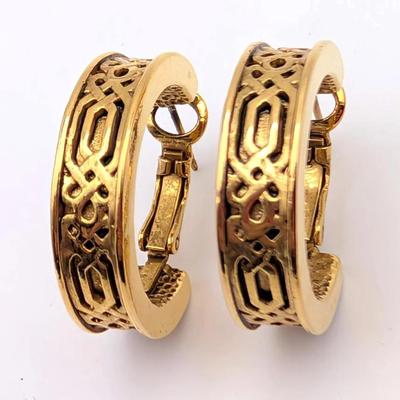Gold Tone Hoop Earrings with Celtic Knot Design