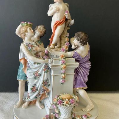 Antique Capodimonte Figural Group With Cherub