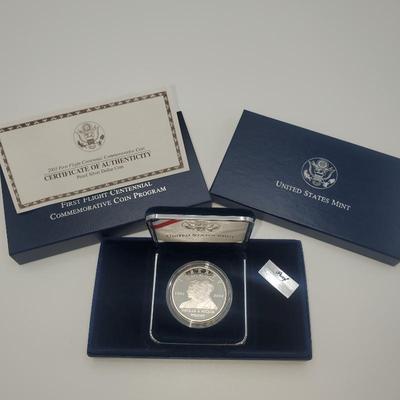 Lot 1156 2003 us mint first flight cnetennial commerative coin program