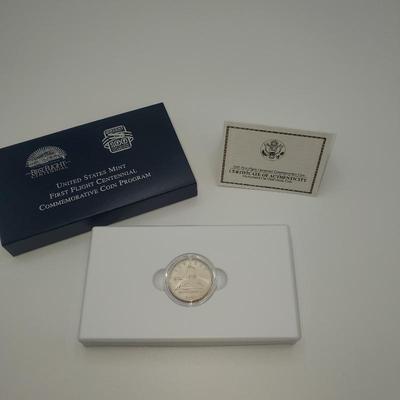 Lot 1155 2003 us mint first flight cnetennial commerative coin program