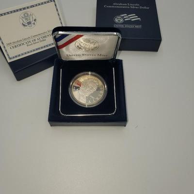 Lot 1128 abe lincoln silver dollar