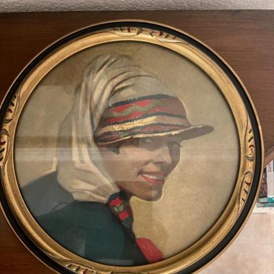 Beautifully framed print of "Grinny" by F. Winold Reiss. The red, blue and gold round frame perfectly picks up the colors of...