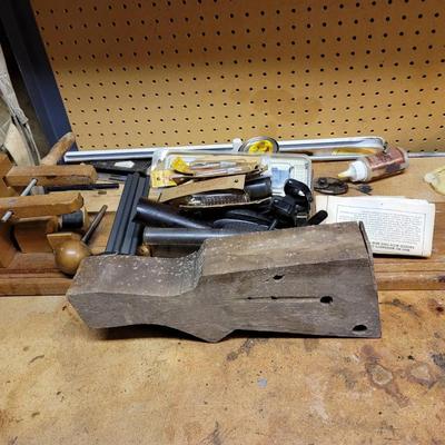 Sighting In Or Repair Work Bench With Pile Of Parts