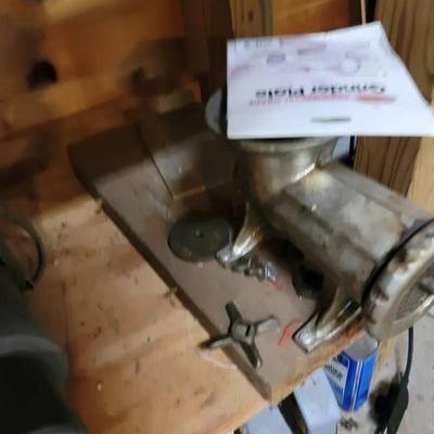 Meat Grinder Mounted To Board 