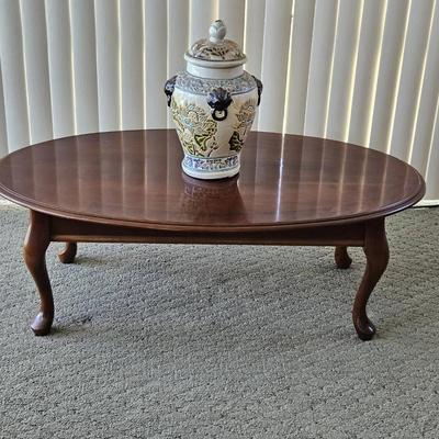 Queen Anne Style Oval Cherry Wood Coffee Table. 