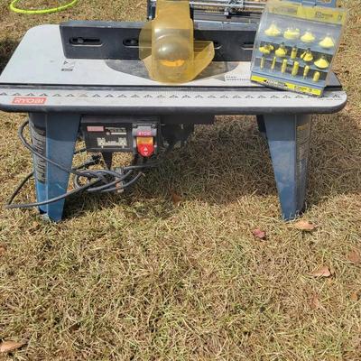 Ryobi A25RT01 Router Table with Router and Box of Tiips