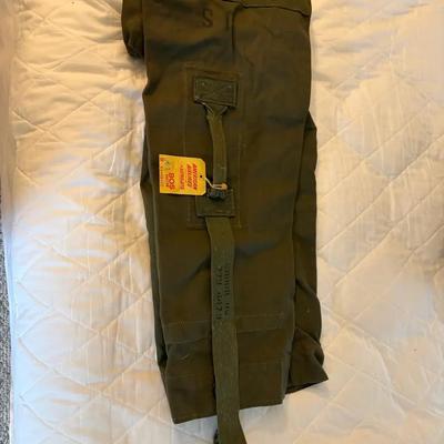Vintage U.S. Military top-load duffle bag in olive drab green 