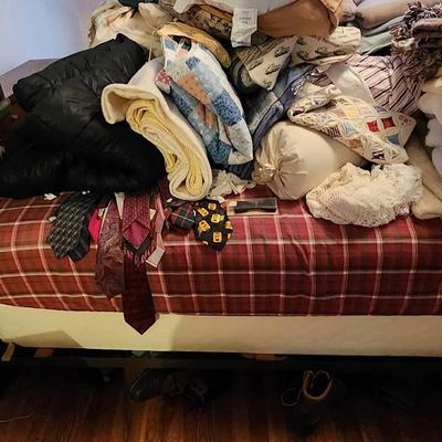Wooden Bed Frame And Miscellaneous Items On Bed!
