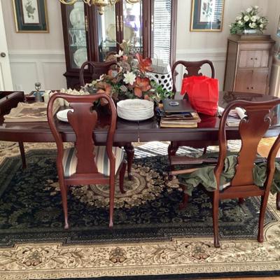 Cherry wood dining table with six chairs
