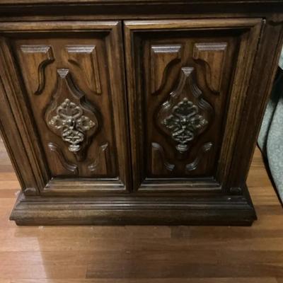 Vintage Wood Cabinet with Ornate Carved Doors and Glass Top