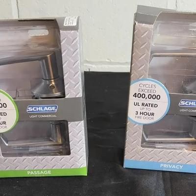 Pair of Schlage Light Commercial Door Levers — Passage & Privacy