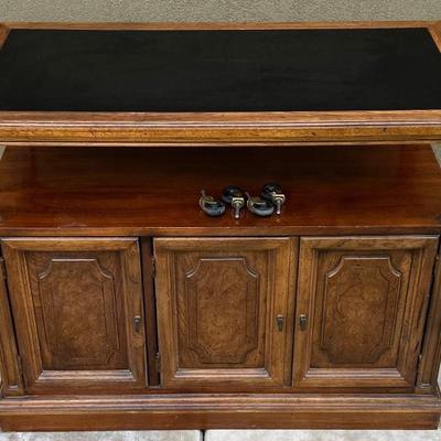 Vintage Buffett Cabinet With Brass Pulls And Casters