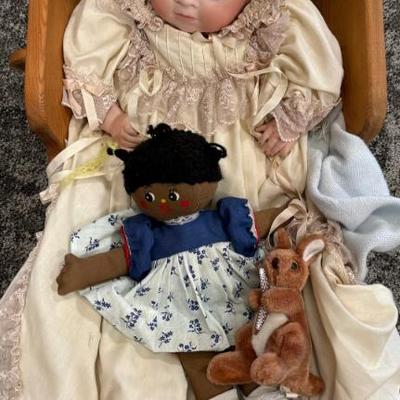 Hand Made Doll Cradle With Porcelain Doll And Antique Dress
Hand Made Doll Cradle With Porcelain Doll And Antique Dress