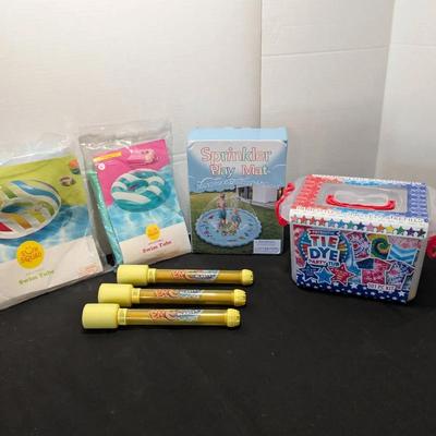 Tie Dye Kit (new), Water Blasters, and New Inflatable Sprinkler Mat, Floats