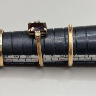 10k and 14k Gold Rings, one with Garnet and Diamonds, one is toe ring 
