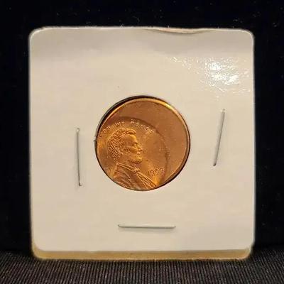 1999 Off-Center Strike Lincoln Cent Error