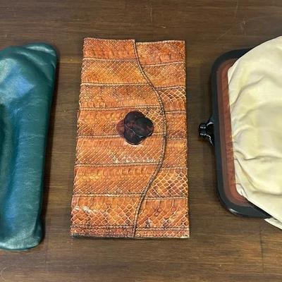 Three Leather Clutch Bags 