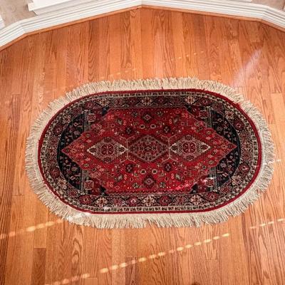 Red Oval Rug