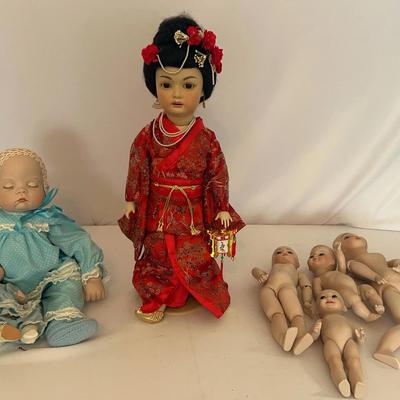 Porcelain Dolls, Body And Head Two Baby Porcelain Dolls Complete One Asian Doll Complete