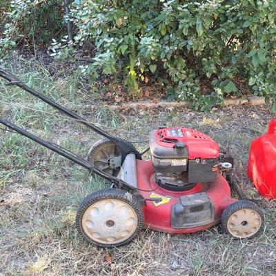 Troy-Bilt 210 gas powered lawnmower + 2 gas containers 