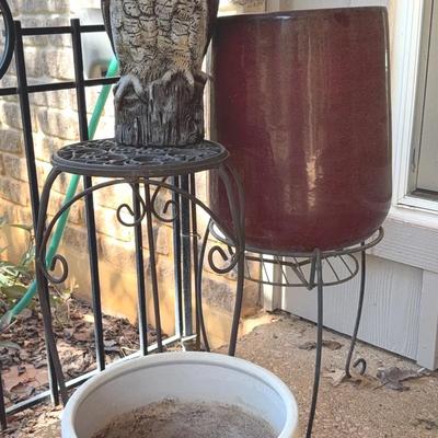 2 concrete pots, 2 stands and an owl decoy 