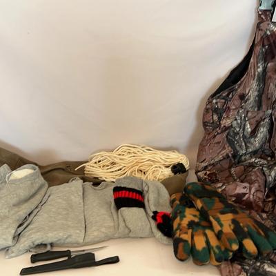 Hunting Attir for cold weather, overalls, gloves, socks, thermal wear, and a bag and a batch of rope